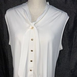 White sleeveless blouse